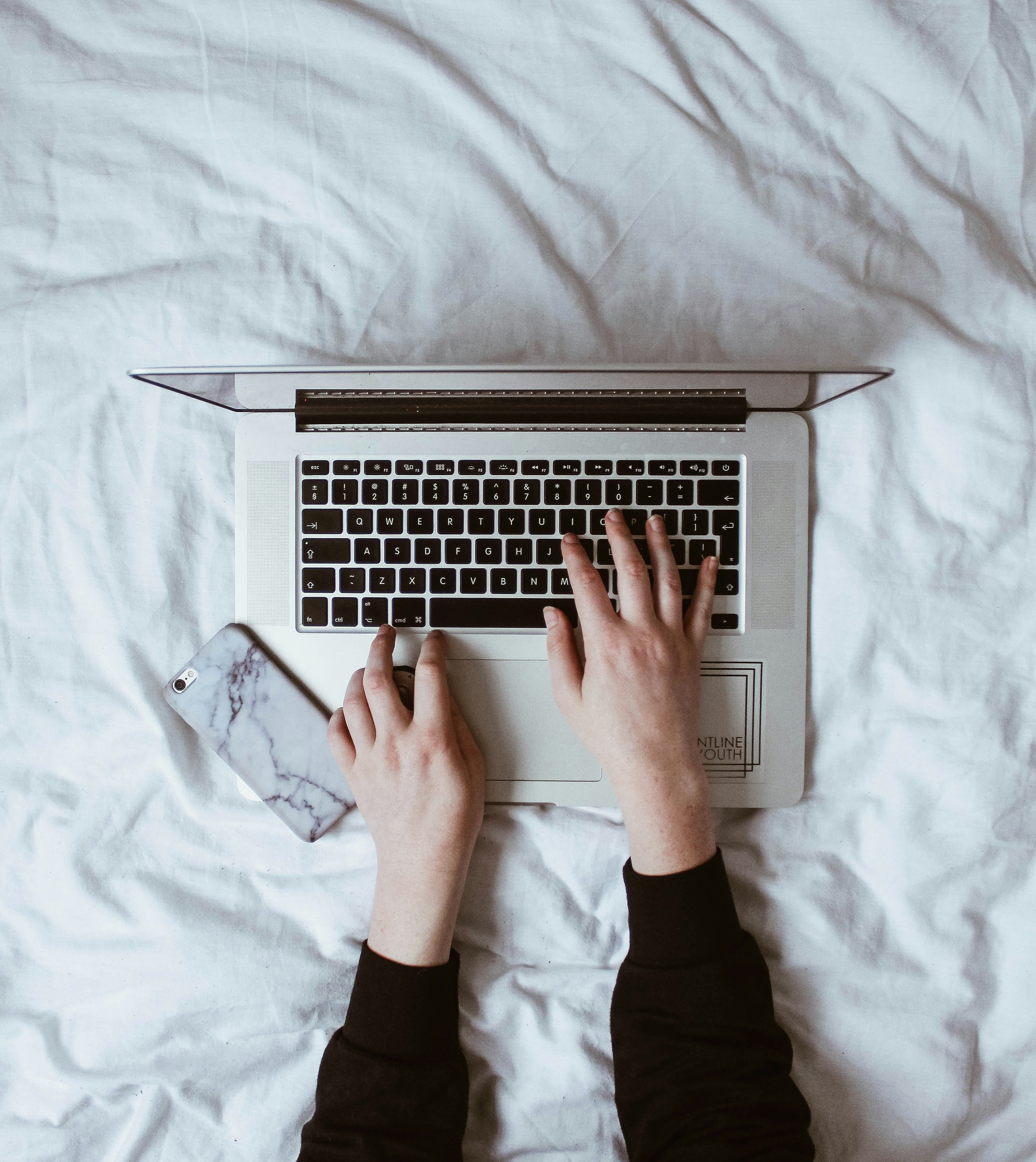 person using laptop computer